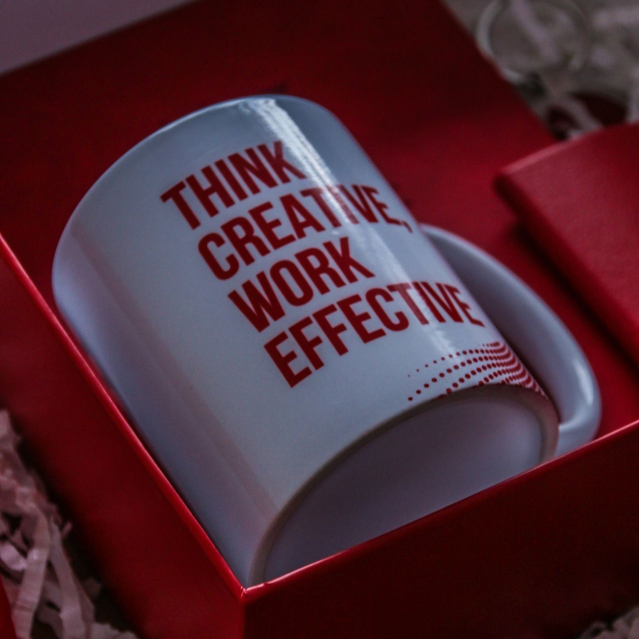 white and red ceramic mug